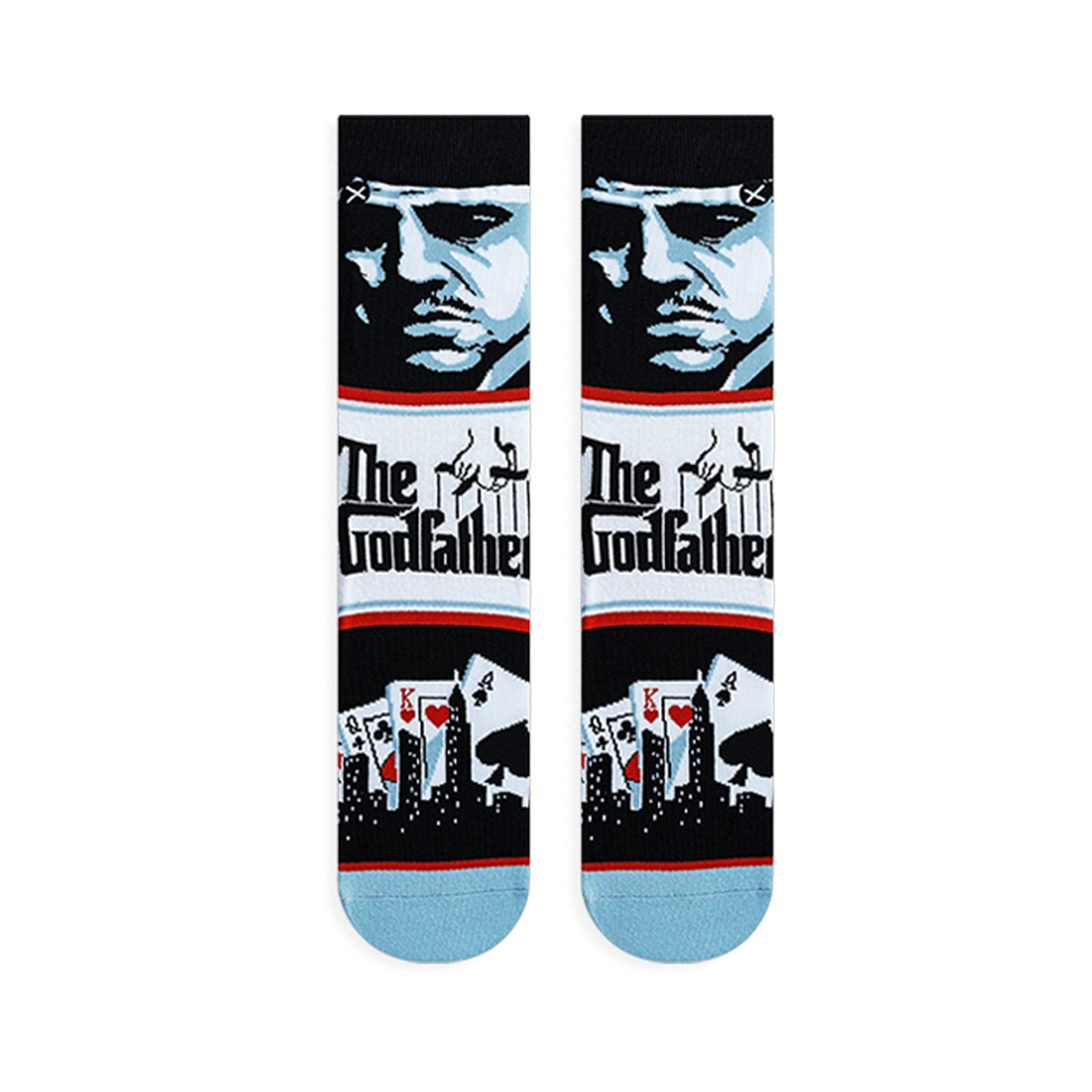 Flat lay of Godfather crew socks displaying a blue character portrait, The Godfather logo, and playing cards with a skyline.