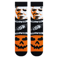 Close-up view of the Halloween Mashup socks, showcasing the detailed artwork and the sock's texture.