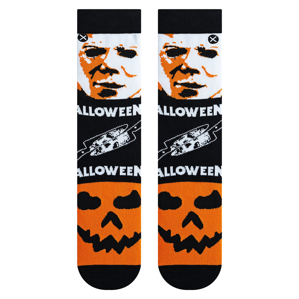 Close-up view of the Halloween Mashup socks, showcasing the detailed artwork and the sock's texture.