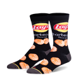 Pair of black crew socks with a fun design featuring the Lay's BBQ chips logo and scattered chip imagery.