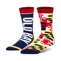 Pair of Old Bay Split crew socks. One sock displays the 'Old Bay' logo in white against a navy blue background. The other sock features a patchwork design of the Maryland state flag, incorporating red, white, yellow, and a crab.