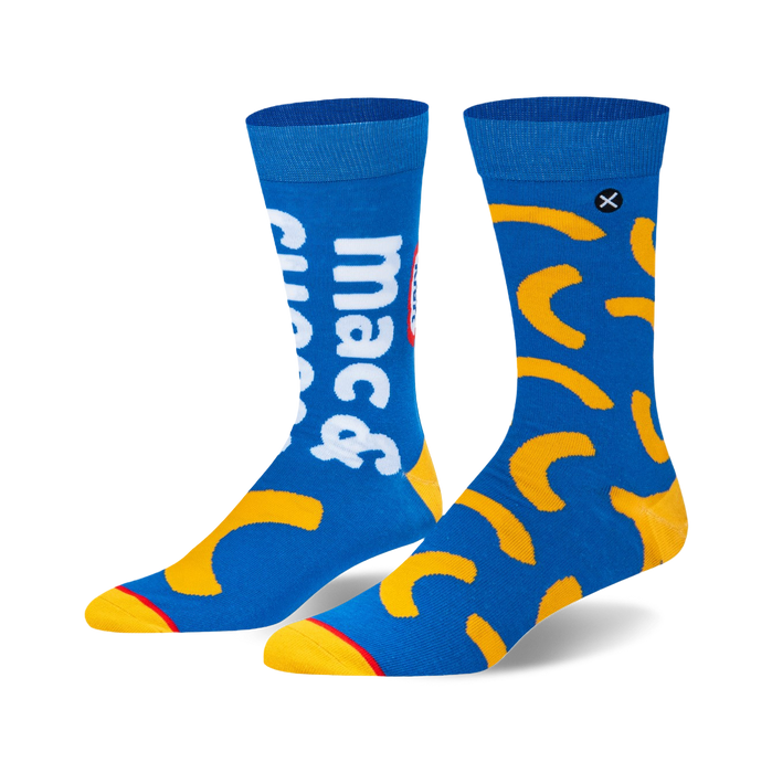 A pair of blue crew socks with a Kraft Mac & Cheese design. Yellow macaroni shapes and 'Mac & Cheese' text are featured. }}