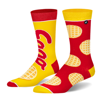 Mismatched crew socks. One is yellow with a red Eggo logo and red accents. The other is red with a yellow waffle pattern.