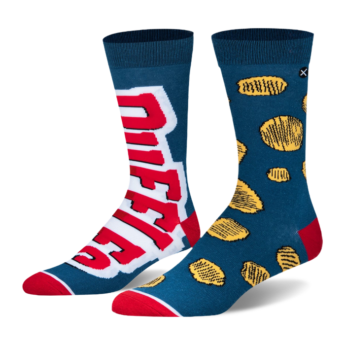 Mismatched teal crew socks. One shows a large red Ruffles logo, the other features a pattern of ridged potato chips. }}