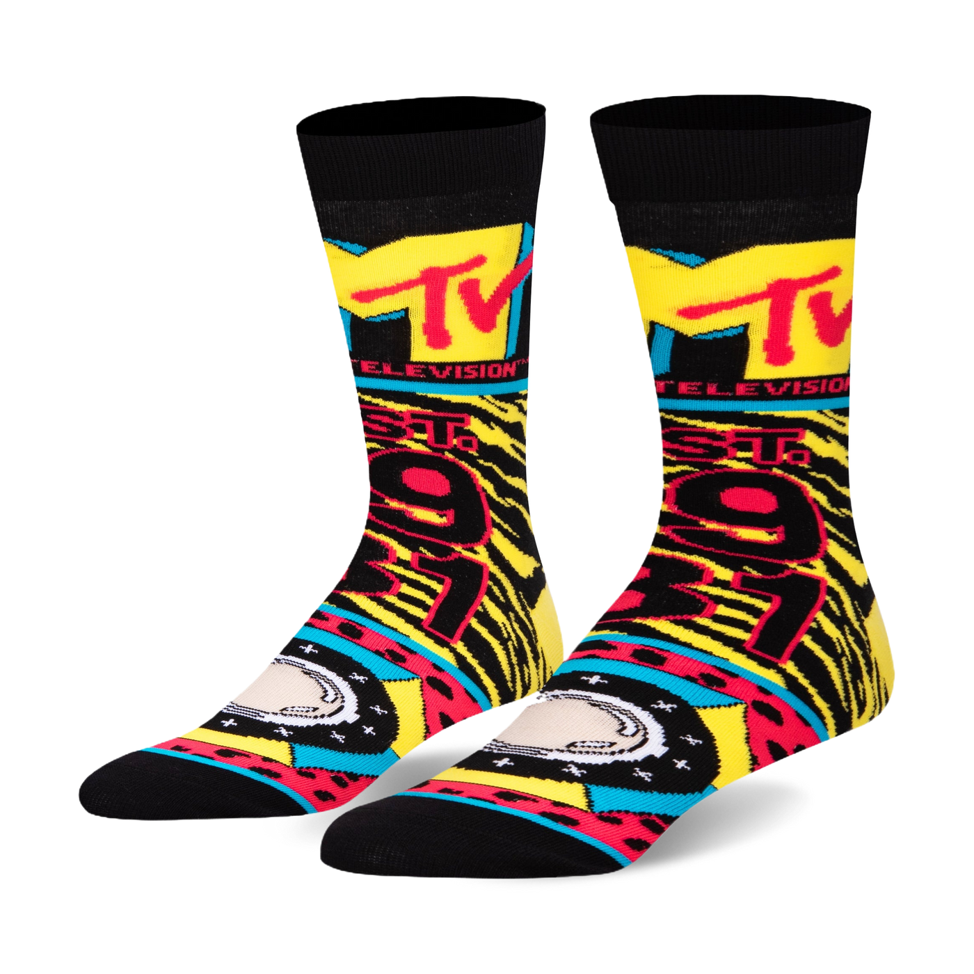 A pair of black crew socks with a vibrant 90s-inspired design.  The socks feature the MTV logo, tiger stripes, and bright yellow, red, and teal accents.