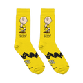 Flat lay of two bright yellow crew socks showing a Charlie Brown graphic, zigzag stripe, and Peanuts logo on the soles.