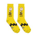 Flat lay of two bright yellow crew socks showing a Charlie Brown graphic, zigzag stripe, and Peanuts logo on the soles.