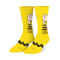 Bright yellow crew socks featuring a pensive Charlie Brown illustration on the leg and his signature black zigzag stripe.