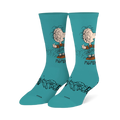 Teal crew socks featuring Peanuts character Pigpen in overalls with his dust cloud and black scribble designs on the foot.
