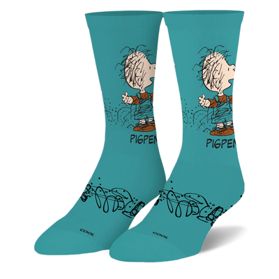 Teal crew socks featuring Peanuts character Pigpen in overalls with his dust cloud and black scribble designs on the foot.