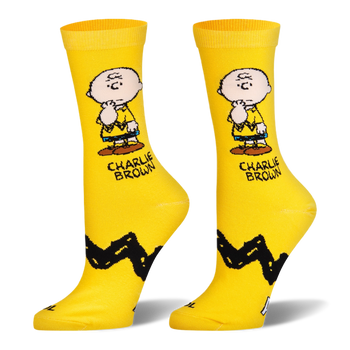 Yellow crew socks showing Charlie Brown thinking, his name in text, and his classic thick black zigzag stripe pattern.