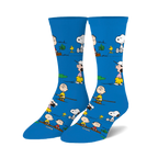 Crew socks in bright blue featuring Peanuts characters like Snoopy and Charlie Brown engaged in outdoor activities. 