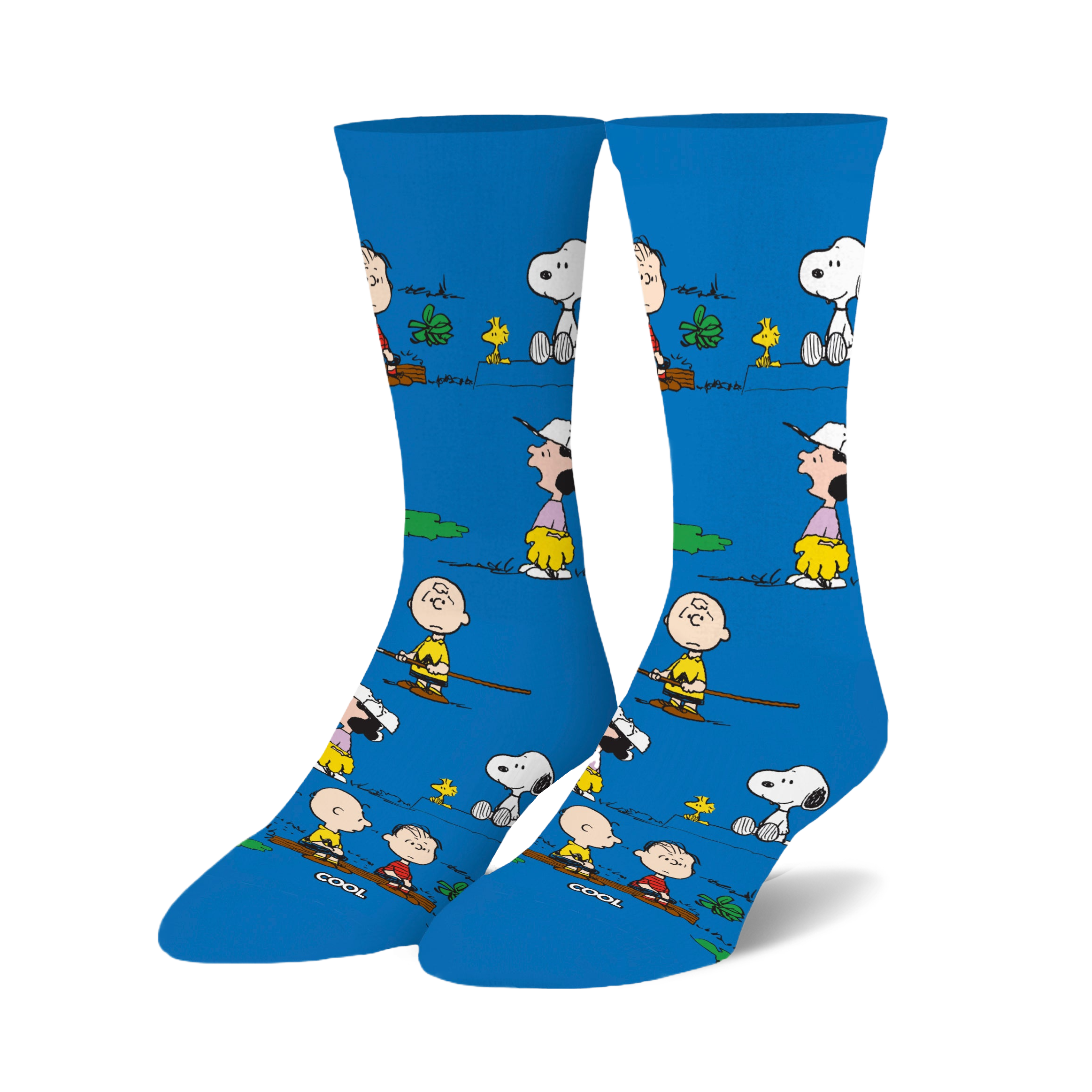 Crew socks in bright blue featuring Peanuts characters like Snoopy and Charlie Brown engaged in outdoor activities. 