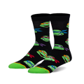 Pair of black crew socks with a fun, colorful Teenage Mutant Ninja Turtles face pattern. Lime green accents at the toe and heel.