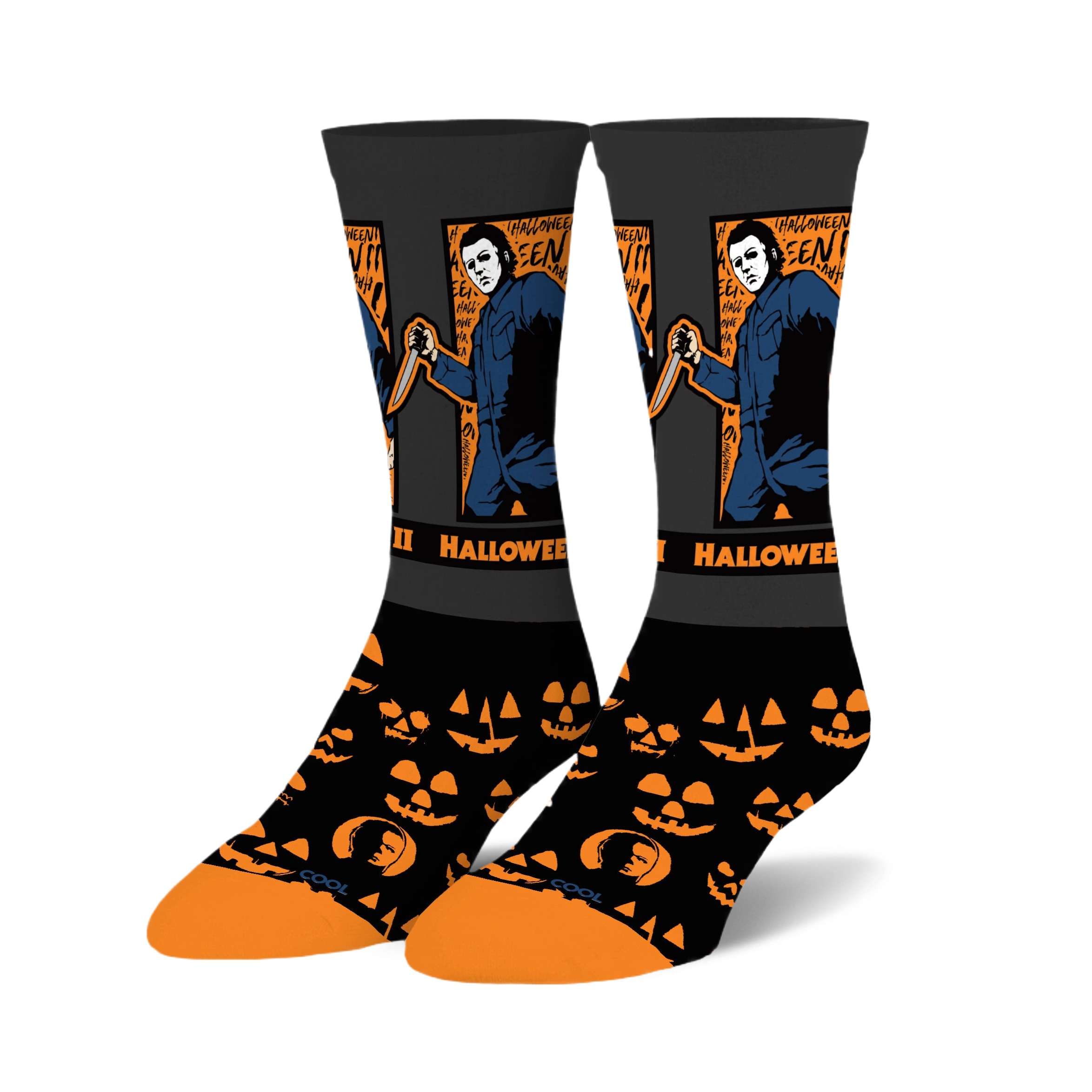 Pair of Halloween II crew socks. Black background with orange jack-o'-lanterns, Michael Myers image and Halloween II text.