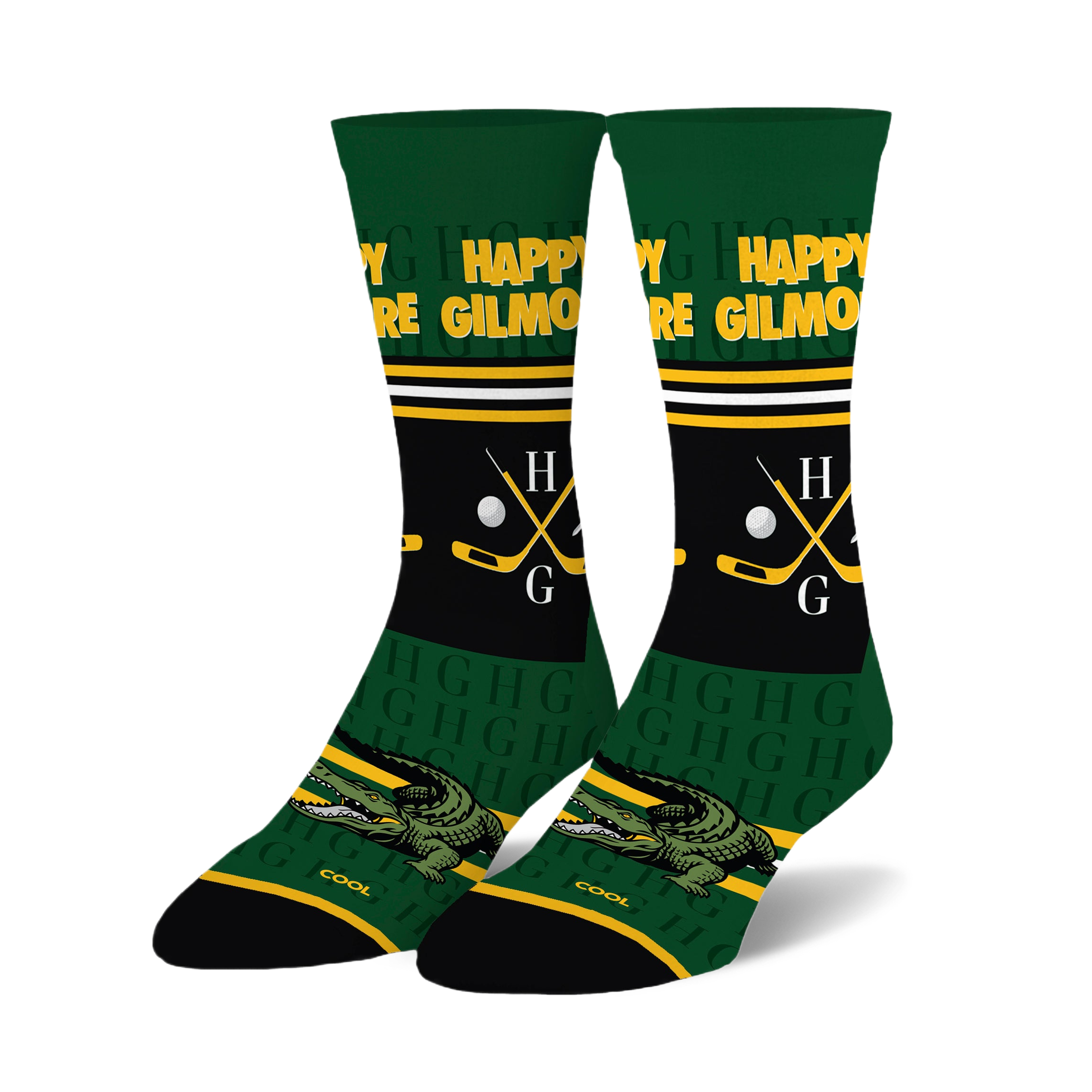 Pair of Happy Gilmore crew socks. Green, black, and white design with alligator, hockey sticks, golf clubs, and Happy Gilmore text.