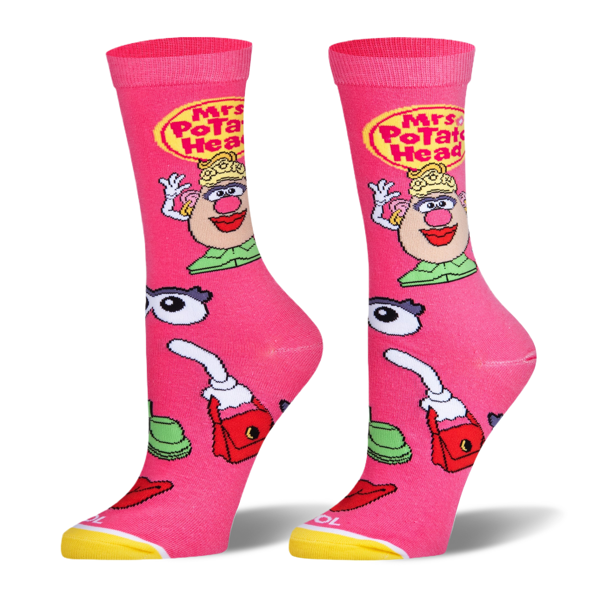 Bright pink socks featuring Mrs. Potato Head, a yellow logo, and scattered accessories like eyes, lips, and a red purse.