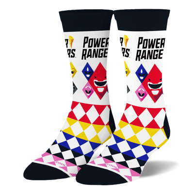 White crew socks with the Power Rangers logo and colored helmet icons, featuring a bright diamond pattern on the lower half.