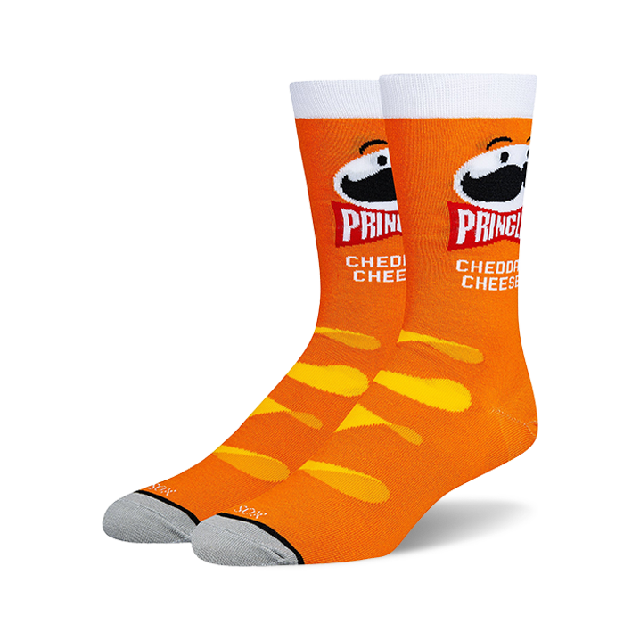 Pair of orange crew socks with a Pringles Cheddar Cheese design.  Features the Pringles can and cheesy chip pattern.