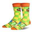 Crew socks featuring a neon green and yellow checkerboard pattern, orange accents, and the Sour Patch Kids logo on the calf.