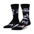 Black crew socks with a white design depicting funny office scenes, including 'parkour' and a person with a pumpkin on their head.