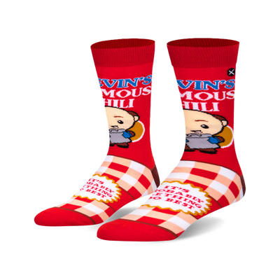 A pair of red crew socks featuring a cartoon character, 'Kevin's Famous Chili' text, and a red and white checkered pattern.