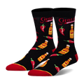 Black crew socks featuring a pattern of Cholula hot sauce bottles, red chili peppers, the Cholula logo, and red toe accents.