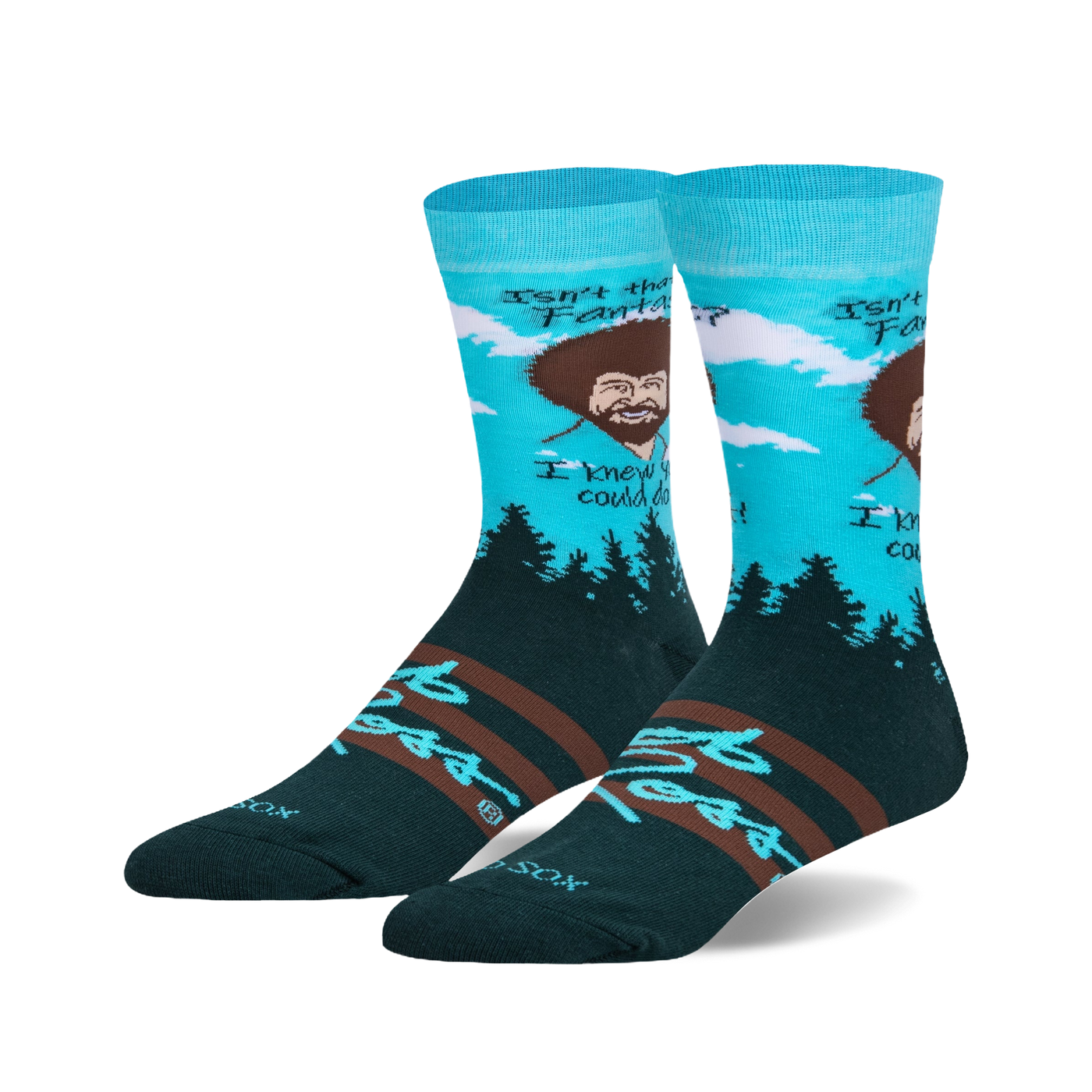 Crew socks in teal, dark green, and brown.  Feature Bob Ross's portrait, his quote, and a pine forest scene.