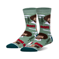 Crew socks in teal green and white featuring Bob Ross's smiling face, paintbrushes, and happy little trees. 