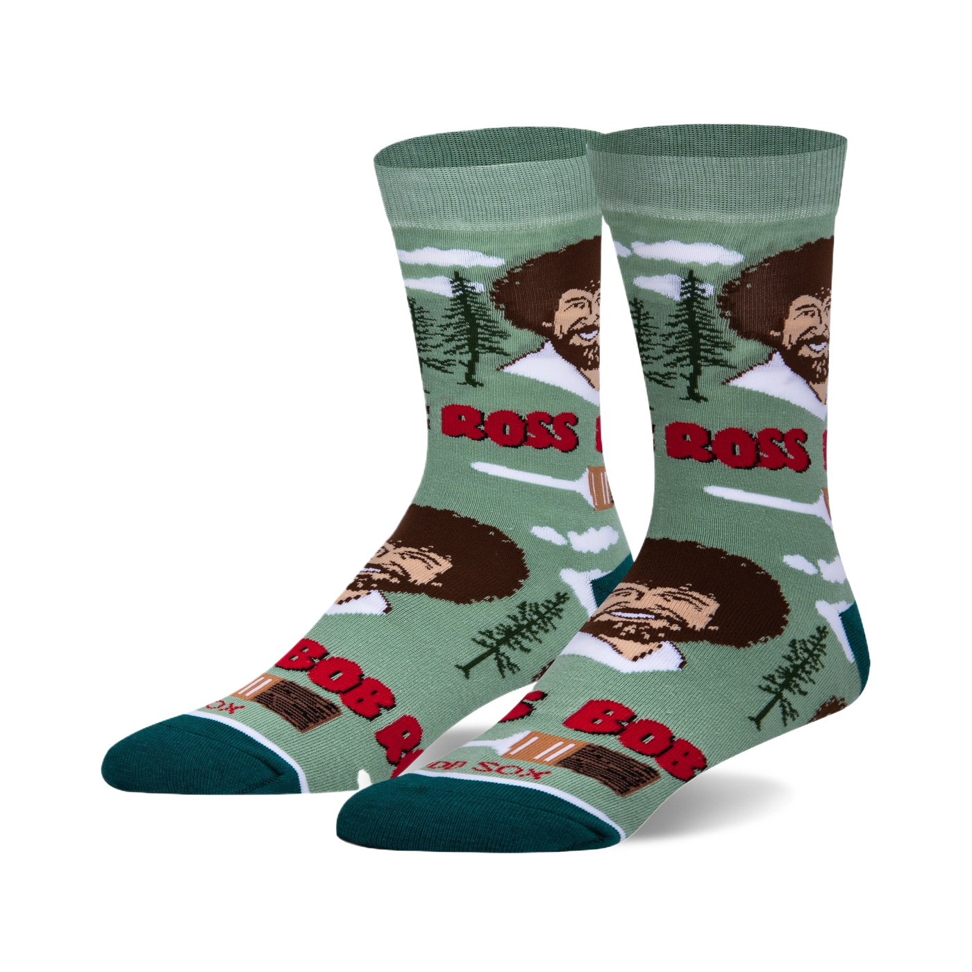 Crew socks in teal green and white featuring Bob Ross's smiling face, paintbrushes, and happy little trees. 