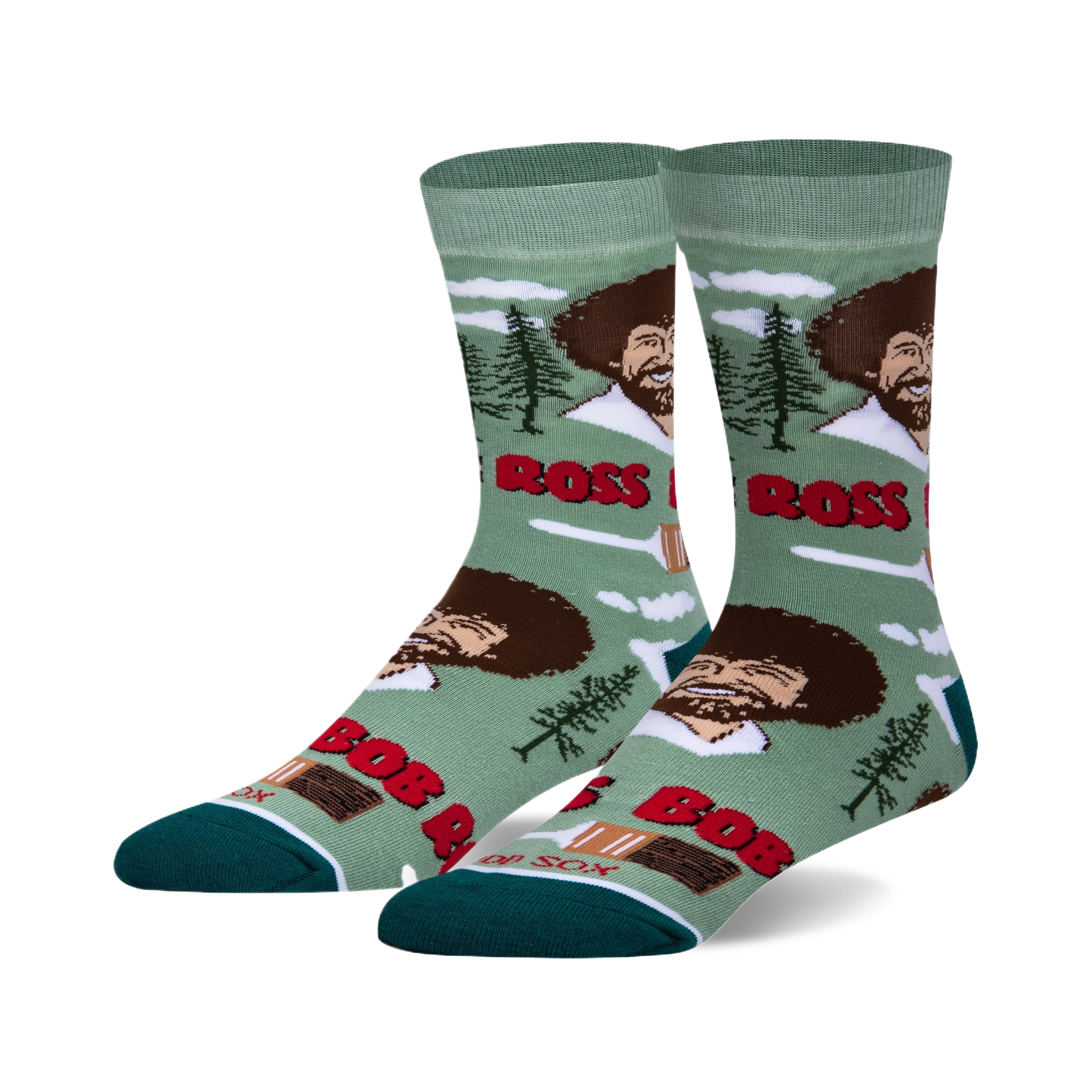 Crew socks in teal green and white featuring Bob Ross's smiling face, paintbrushes, and happy little trees. 