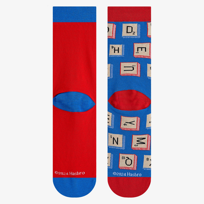 Close-up shot of the back of the socks, highlighting the red cuff and blue heel detail.