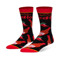 Black crew socks featuring a pattern of Frank's RedHot sauce bottles and red chili peppers, with a bright red toe and cuff.