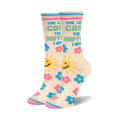 Cream-colored crew socks with 'The Less I Care, The Happier I Am' text, suns, and pink and blue flowers. 