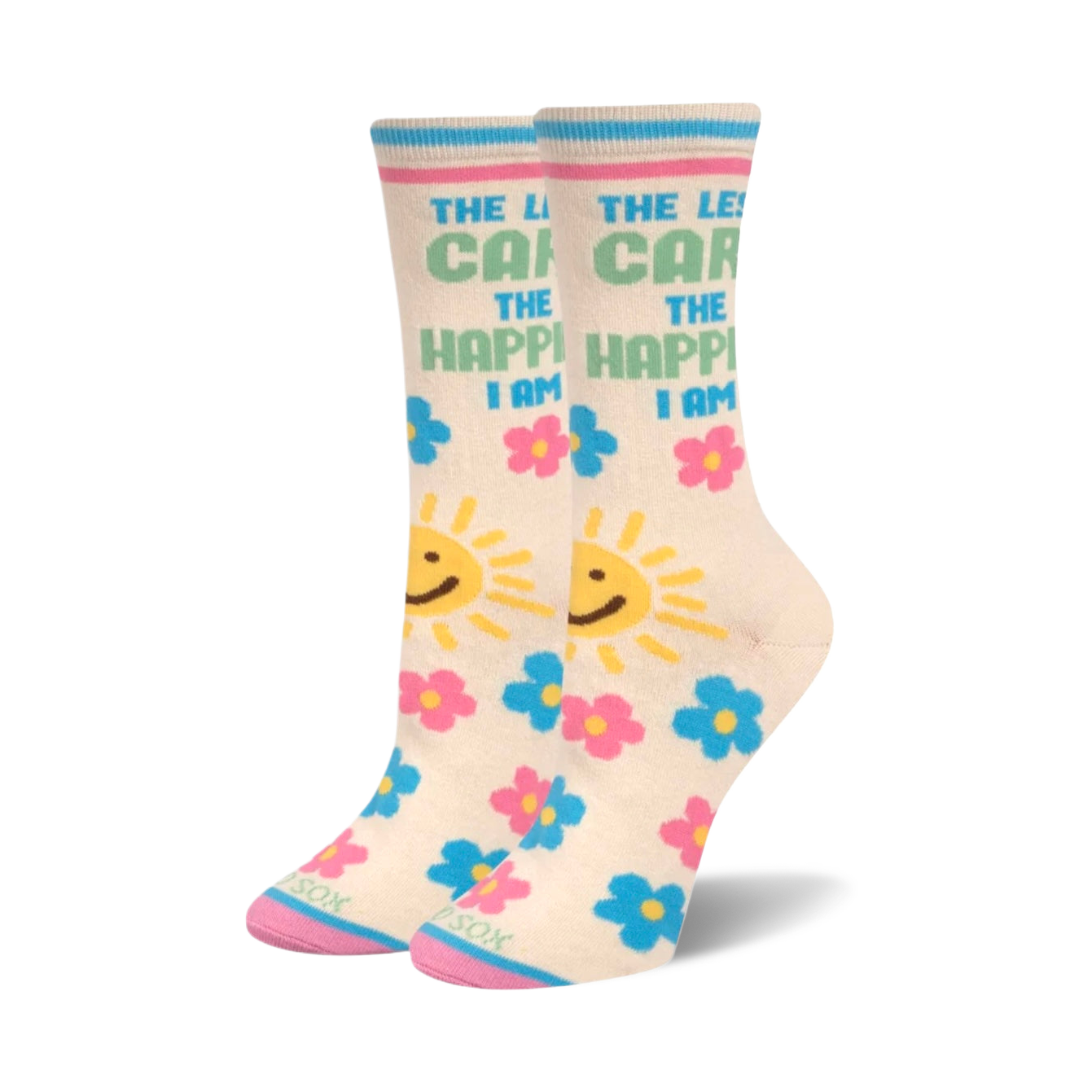 Cream-colored crew socks with 'The Less I Care, The Happier I Am' text, suns, and pink and blue flowers. 
