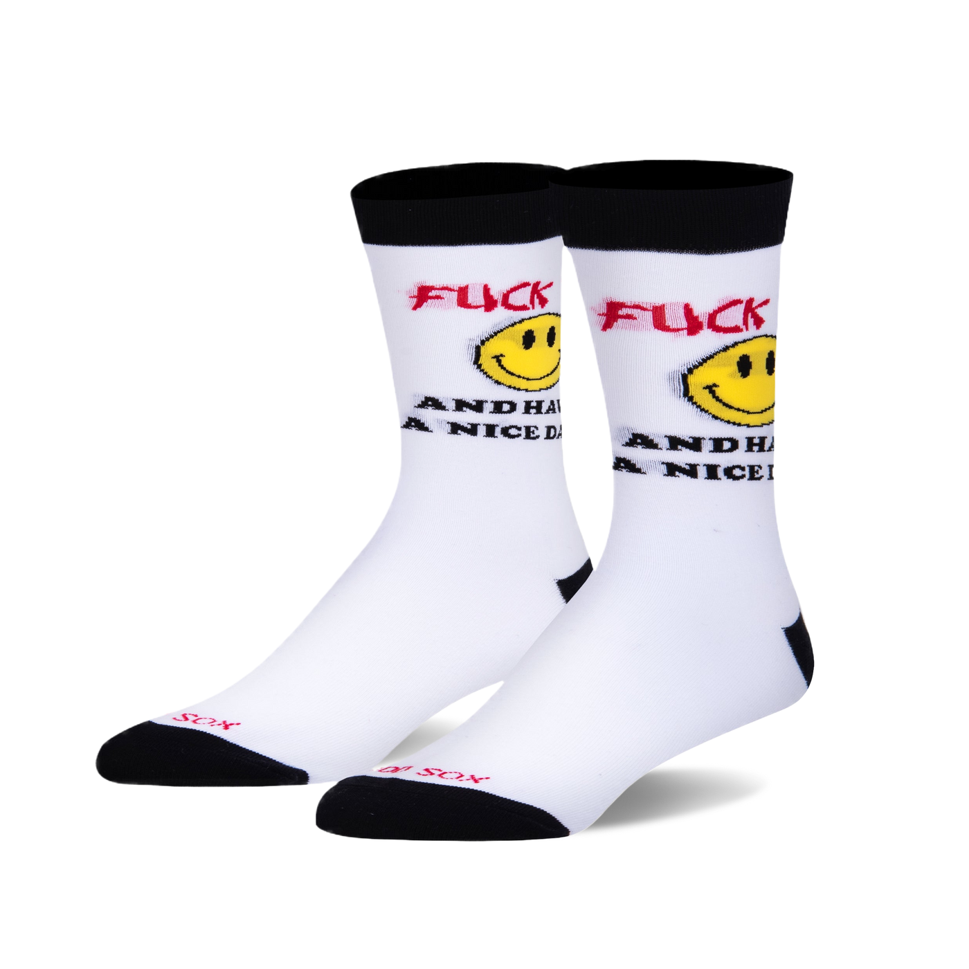A pair of white crew socks with a black cuff.  The socks feature red text that says 'F*ck and have a nice day' and a yellow smiley face graphic.