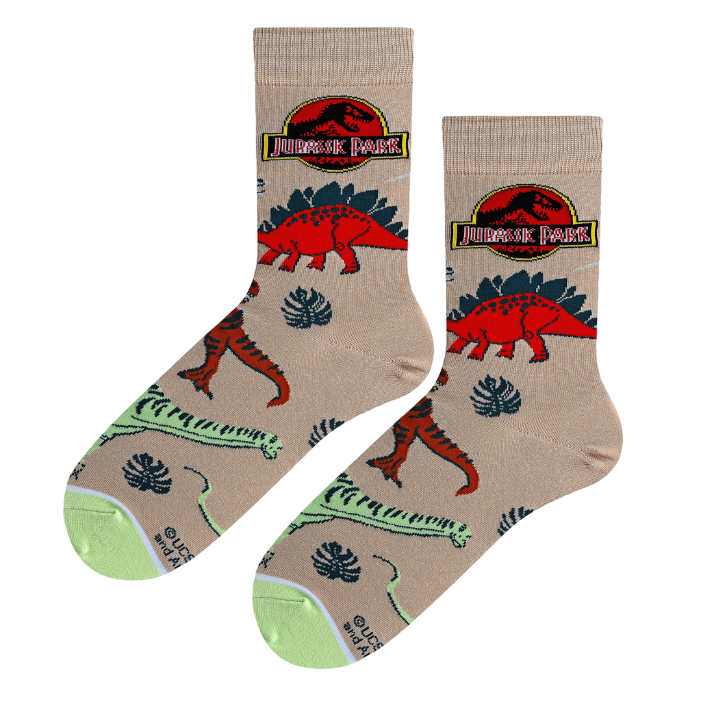 A pair of Jurassic Park dino socks laid flat, showcasing the design details and color scheme.