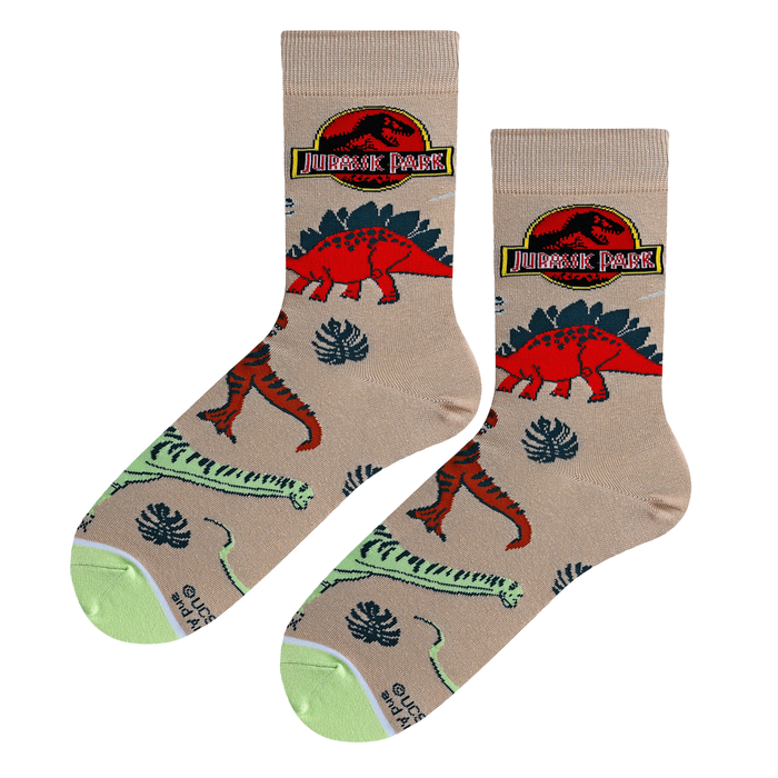 A pair of Jurassic Park dino socks laid flat, showcasing the design details and color scheme.