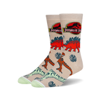 Tan crew socks with a Jurassic Park theme.  Features red and orange dinosaurs, tropical leaves, and the Jurassic Park logo.