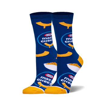 Pair of women's crew socks. Blue background with yellow Kraft Mac & Cheese logos and macaroni graphics.