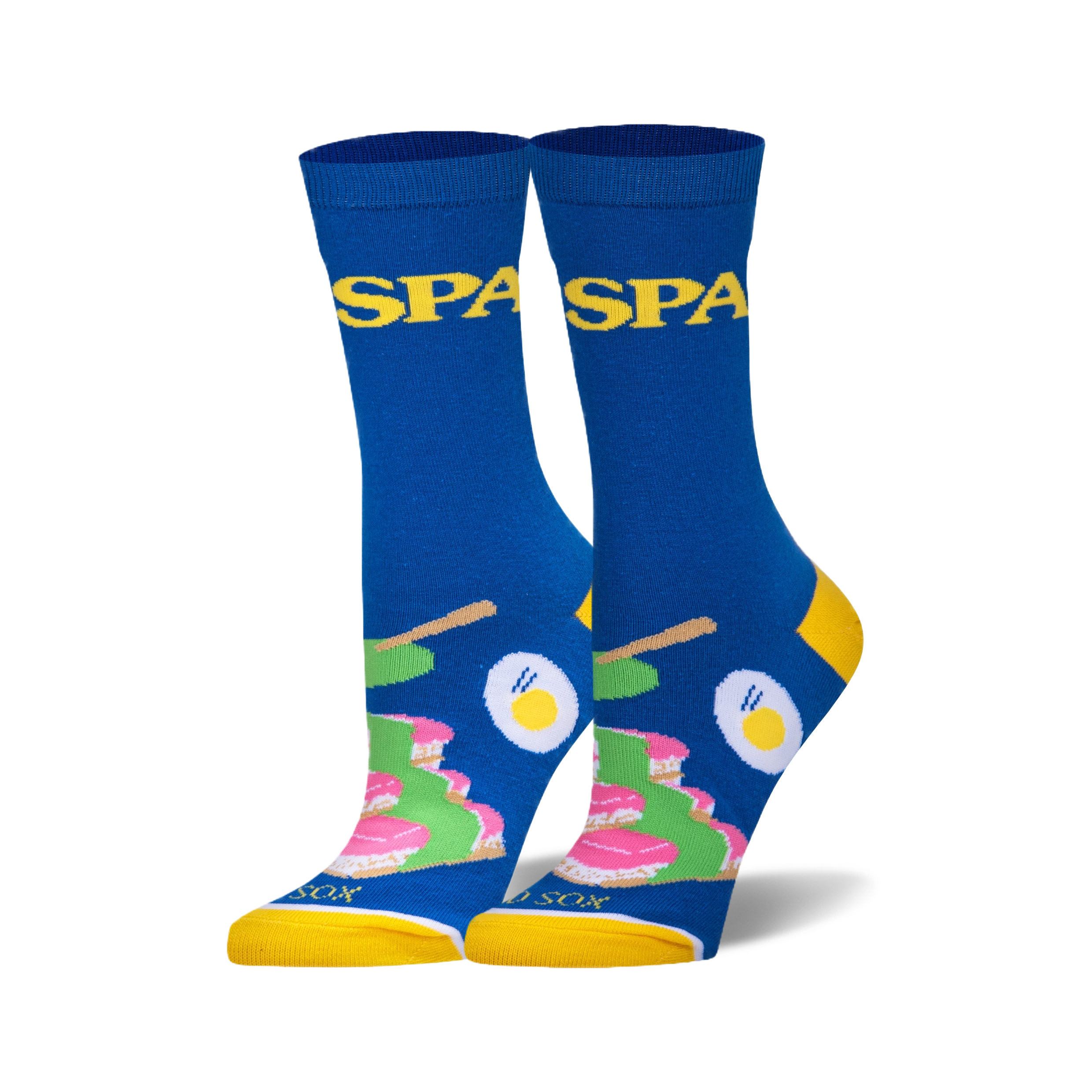 Pair of blue crew socks with yellow cuffs. Features a fun spa-themed design with images of cakes, eggs, and chopsticks, and the word 'Spa' repeated.