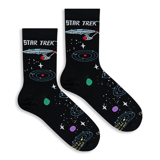 Flat lay of two black Star Trek socks showing the Enterprise ship and colorful orbiting planets.