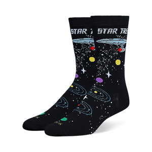 Black Star Trek crew socks showing the USS Enterprise, retro logo text, white stars, and colorful orbiting planets.