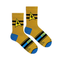 Flat lay of folded yellow socks showing the black and yellow Starfleet command insignia, black stripes, and blue toes.