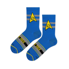 Flat lay of blue socks showing the Starfleet science insignia and Star Trek text across the striped foot.