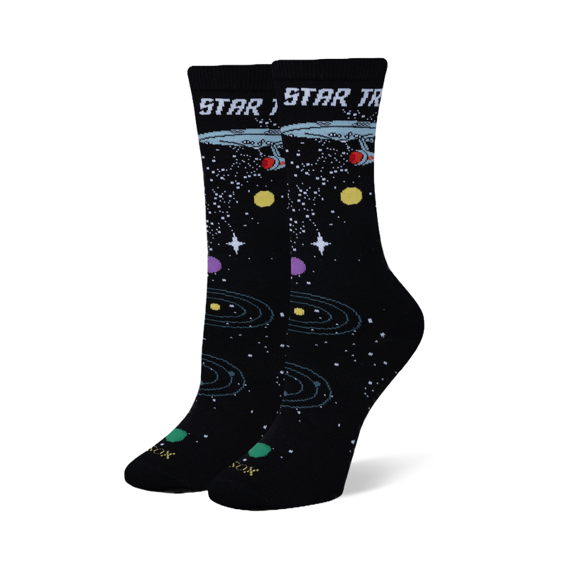 Black crew socks featuring the Star Trek logo, USS Enterprise, white stars, orbital rings, and colorful planets.