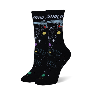 Black crew socks featuring the Star Trek logo, USS Enterprise, white stars, orbital rings, and colorful planets.