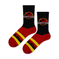 Lifestyle shot of Jurassic Park logo socks on a model's feet.
