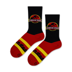 Lifestyle shot of Jurassic Park logo socks on a model's feet.