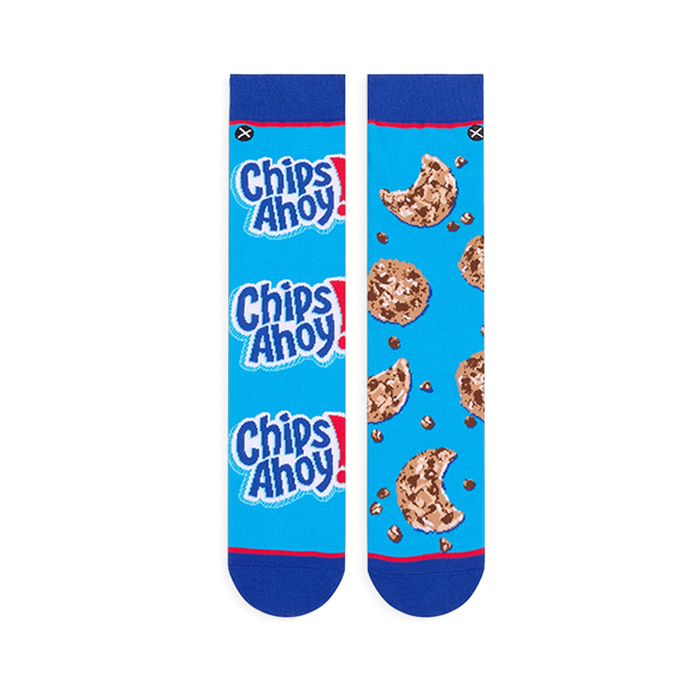 Flat lay of two blue socks side-by-side. Left sock has stacked Chips Ahoy! logos, right sock has a bitten cookie pattern.